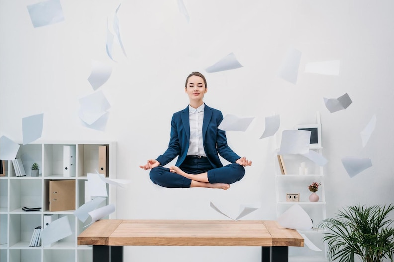 20230803175734 fpdl.in smiling young businesswoman with closed eyes meditating while levitating workplace with papers 651873 10 medium